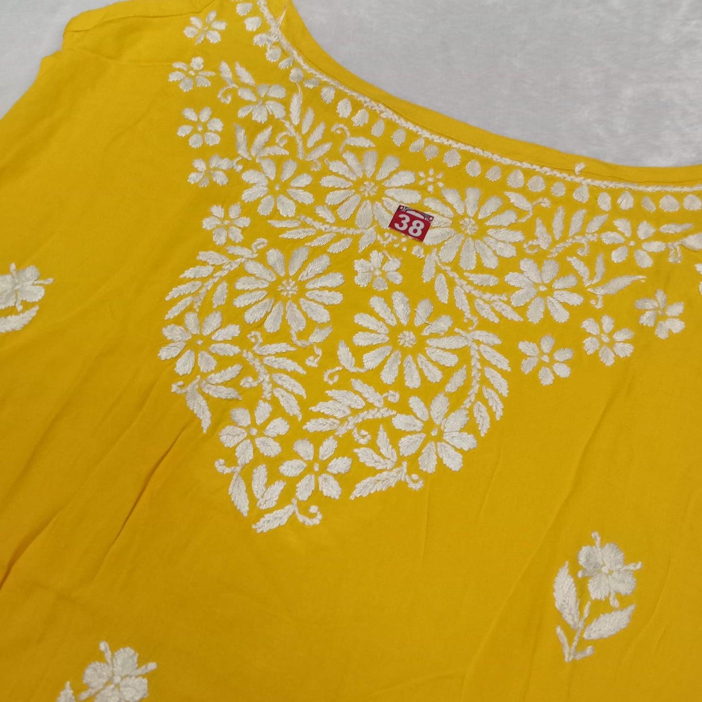Nafisa Chikankari Sleeveless Short Kurti -Yellow Colour - Chikankaar